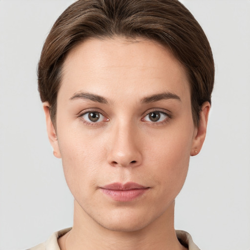 Neutral white young-adult female with short  brown hair and grey eyes