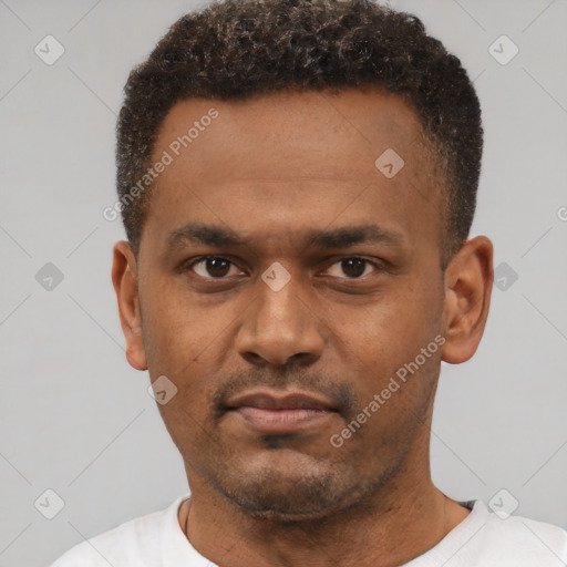 Neutral black young-adult male with short  black hair and brown eyes