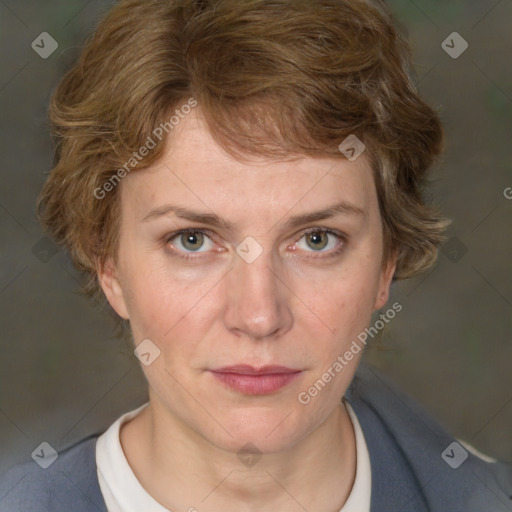 Joyful white adult female with medium  brown hair and blue eyes