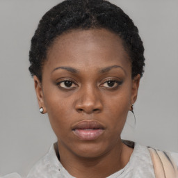 Neutral black young-adult female with short  brown hair and brown eyes