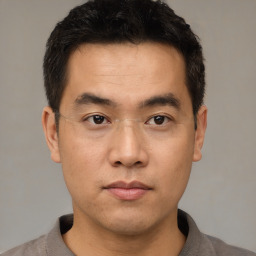 Neutral asian young-adult male with short  black hair and brown eyes