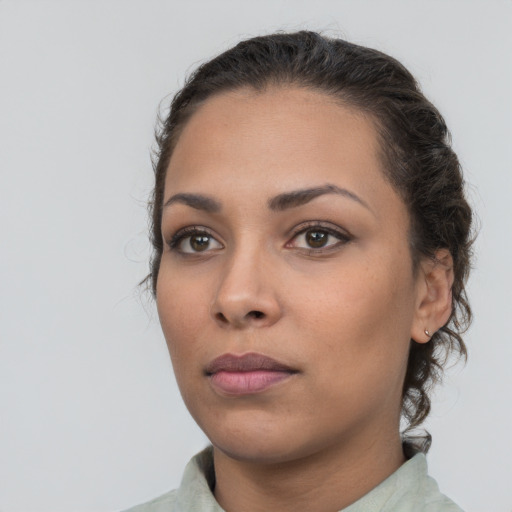 Neutral white young-adult female with short  brown hair and brown eyes