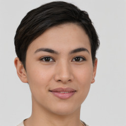 Joyful asian young-adult female with short  brown hair and brown eyes