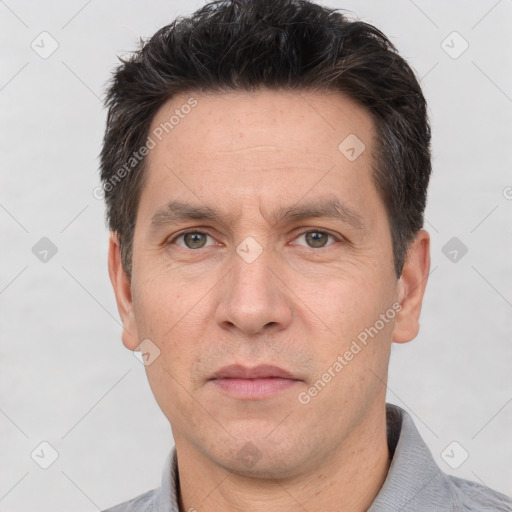 Neutral white adult male with short  brown hair and brown eyes