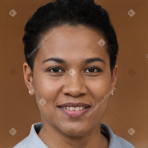Joyful black young-adult female with short  black hair and brown eyes