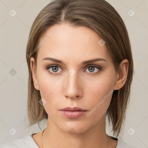 Neutral white young-adult female with medium  brown hair and brown eyes