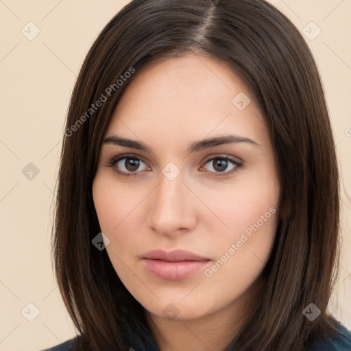 Neutral white young-adult female with long  brown hair and brown eyes