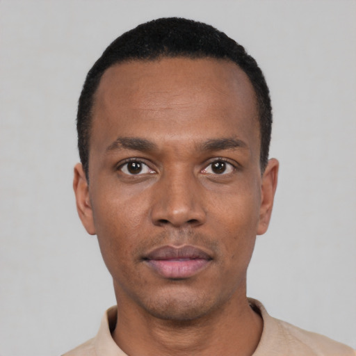 Neutral black young-adult male with short  black hair and brown eyes