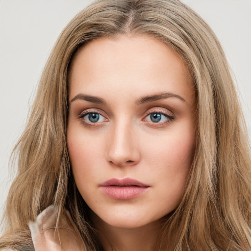 Neutral white young-adult female with long  brown hair and green eyes