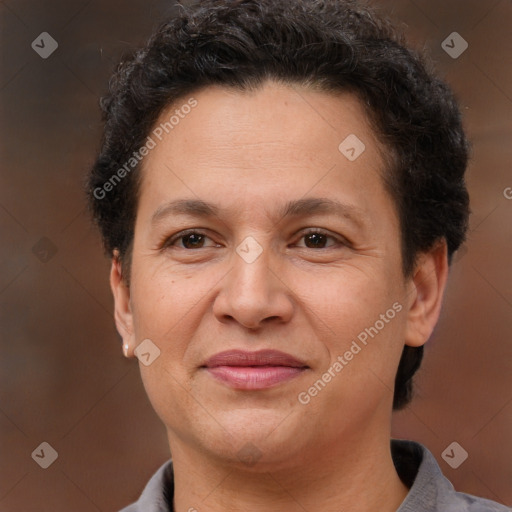 Joyful white adult female with short  brown hair and brown eyes