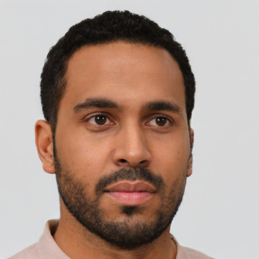Neutral black young-adult male with short  black hair and brown eyes