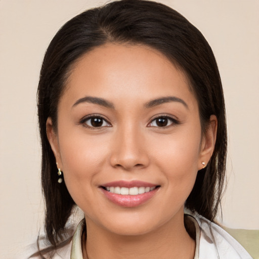 Joyful white young-adult female with medium  brown hair and brown eyes