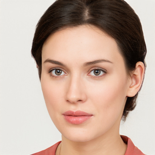 Neutral white young-adult female with medium  brown hair and brown eyes