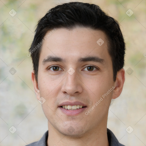 Joyful white young-adult male with short  black hair and brown eyes