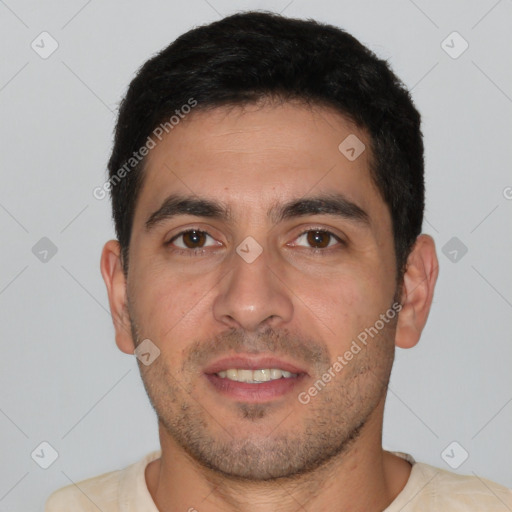 Joyful white young-adult male with short  brown hair and brown eyes