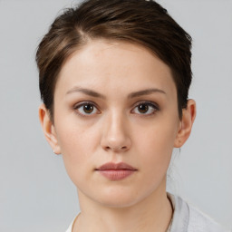 Neutral white young-adult female with short  brown hair and brown eyes