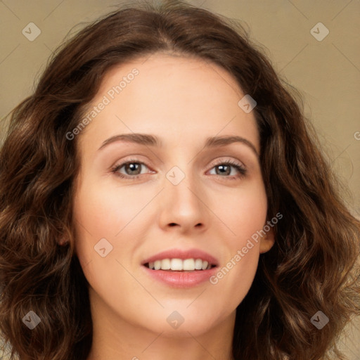 Joyful white young-adult female with long  brown hair and green eyes