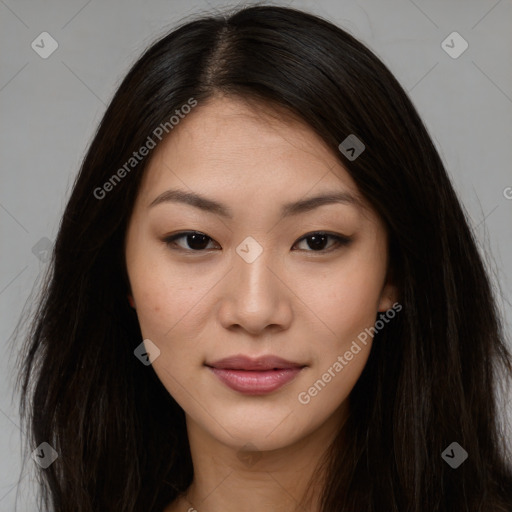 Joyful asian young-adult female with long  brown hair and brown eyes