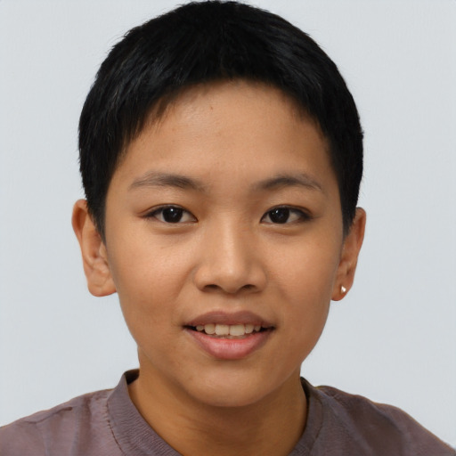 Joyful asian young-adult female with short  black hair and brown eyes