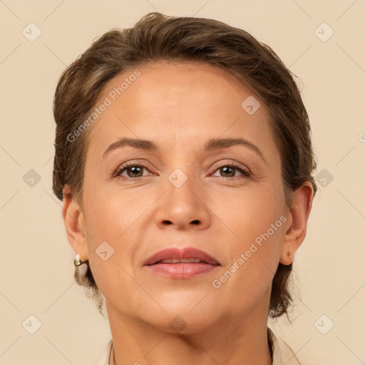 Joyful white adult female with medium  brown hair and brown eyes