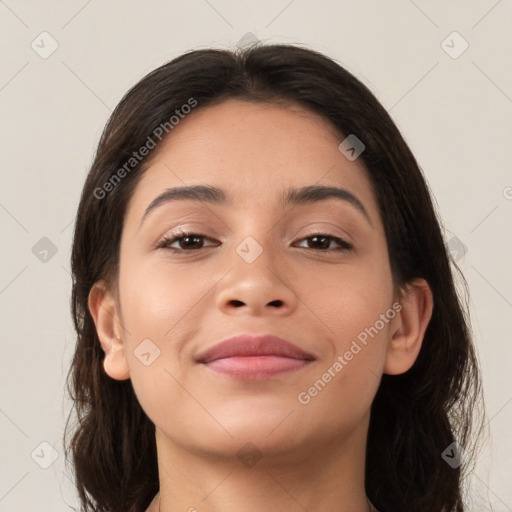 Joyful asian young-adult female with long  brown hair and brown eyes