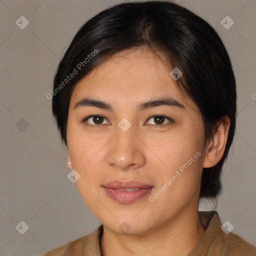 Joyful asian young-adult female with medium  brown hair and brown eyes