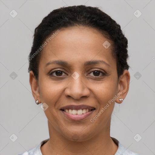 Joyful latino young-adult female with short  brown hair and brown eyes