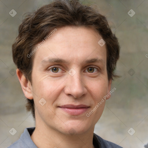 Joyful white adult female with short  brown hair and grey eyes