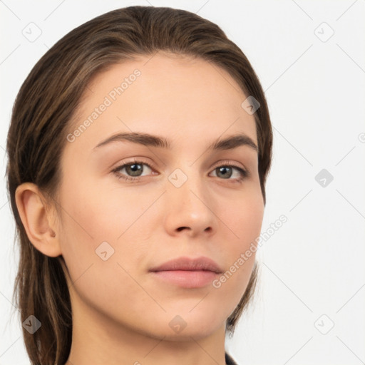 Neutral white young-adult female with long  brown hair and brown eyes