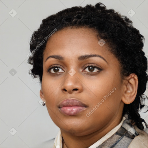 Neutral black young-adult female with short  black hair and brown eyes