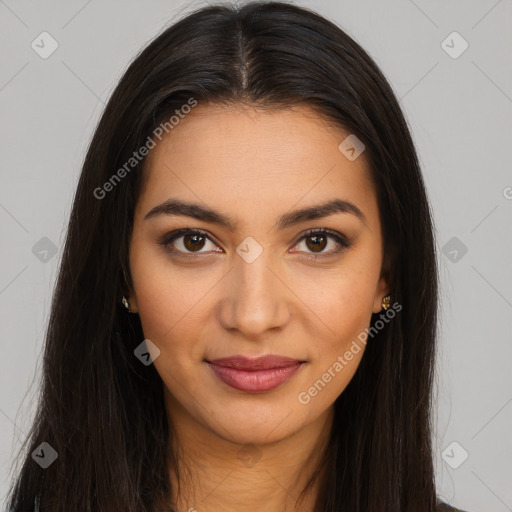 Joyful latino young-adult female with long  brown hair and brown eyes