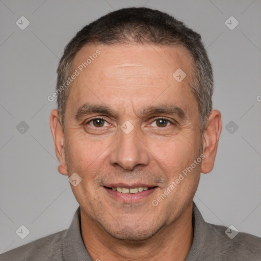 Joyful white adult male with short  brown hair and brown eyes