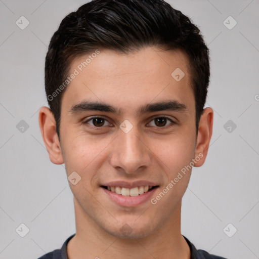 Joyful white young-adult male with short  brown hair and brown eyes