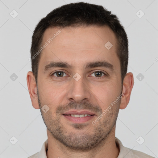 Joyful white young-adult male with short  brown hair and brown eyes