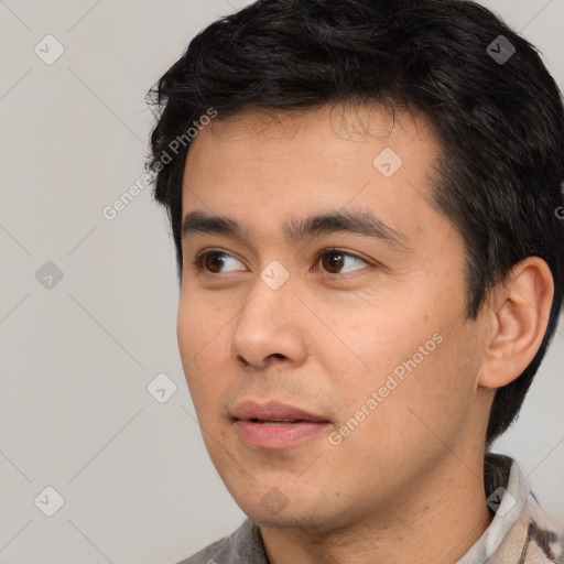 Neutral white young-adult male with short  black hair and brown eyes