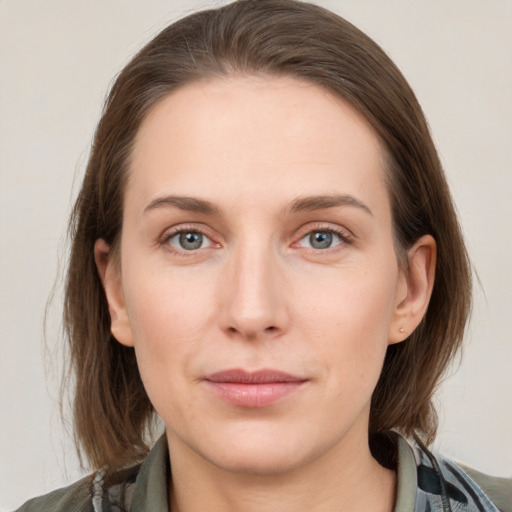 Neutral white young-adult female with medium  brown hair and grey eyes