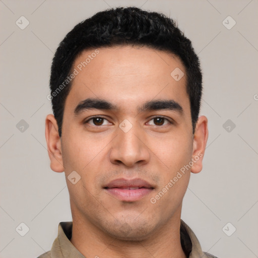 Joyful latino young-adult male with short  black hair and brown eyes