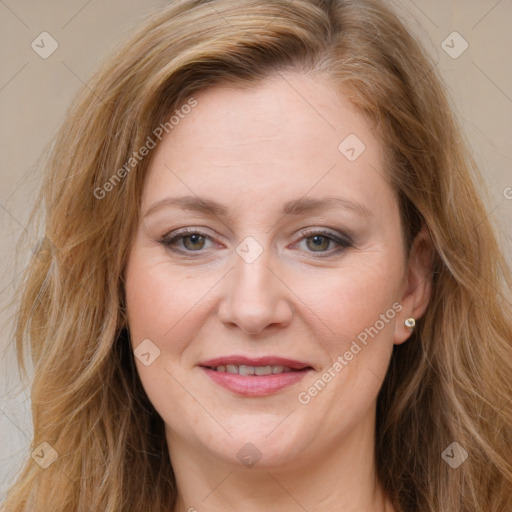 Joyful white young-adult female with long  brown hair and green eyes