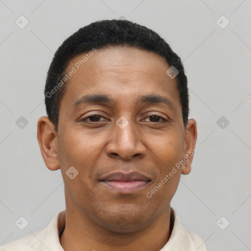 Joyful latino adult male with short  black hair and brown eyes