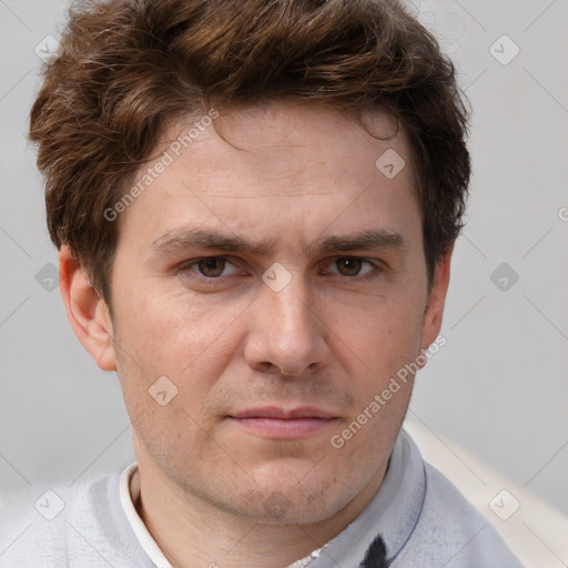 Joyful white adult male with short  brown hair and grey eyes