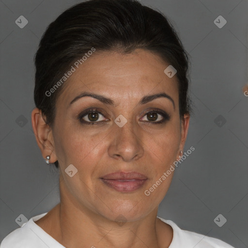 Joyful white adult female with short  brown hair and brown eyes