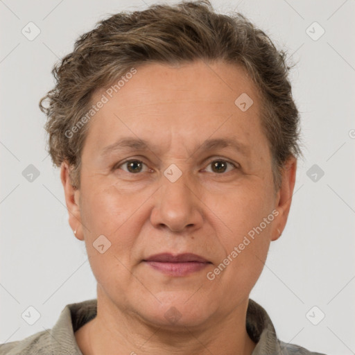 Joyful white adult female with short  brown hair and brown eyes