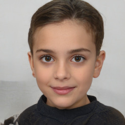 Joyful white child female with short  brown hair and brown eyes