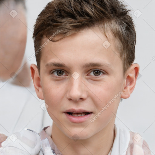 Joyful white child male with short  brown hair and brown eyes