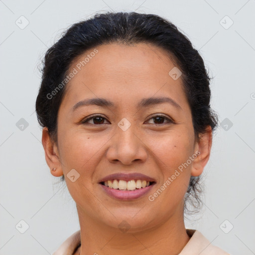 Joyful asian young-adult female with short  brown hair and brown eyes