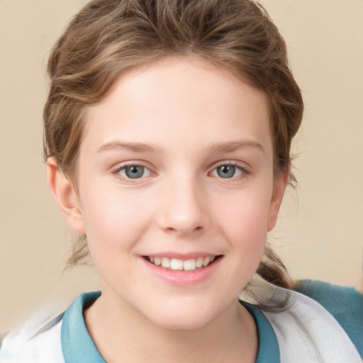 Joyful white child female with short  brown hair and grey eyes