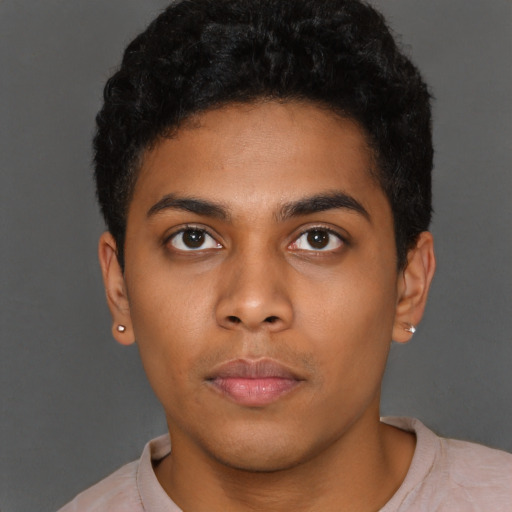 Neutral black young-adult male with short  black hair and brown eyes
