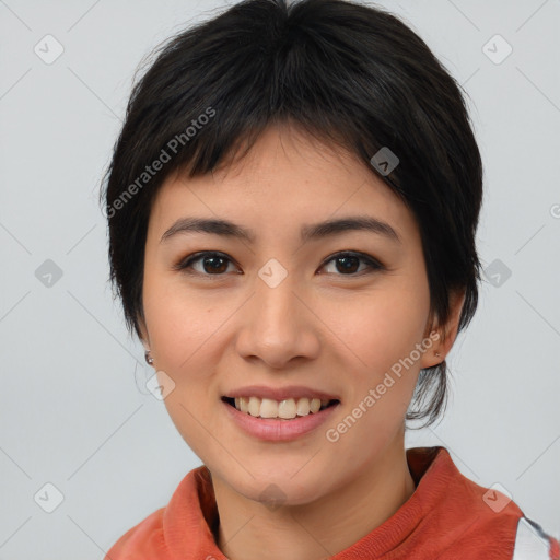 Joyful asian young-adult female with short  black hair and brown eyes