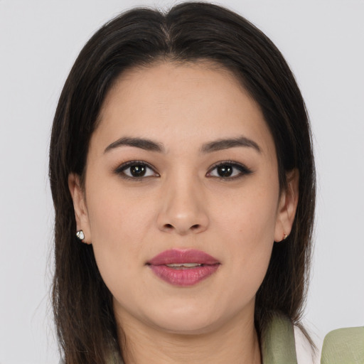 Joyful white young-adult female with long  brown hair and brown eyes