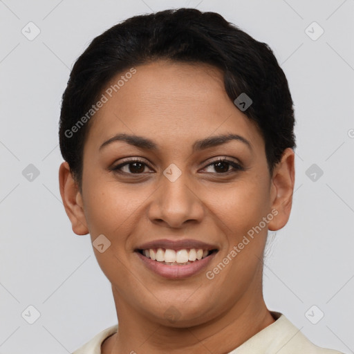 Joyful latino young-adult female with short  brown hair and brown eyes